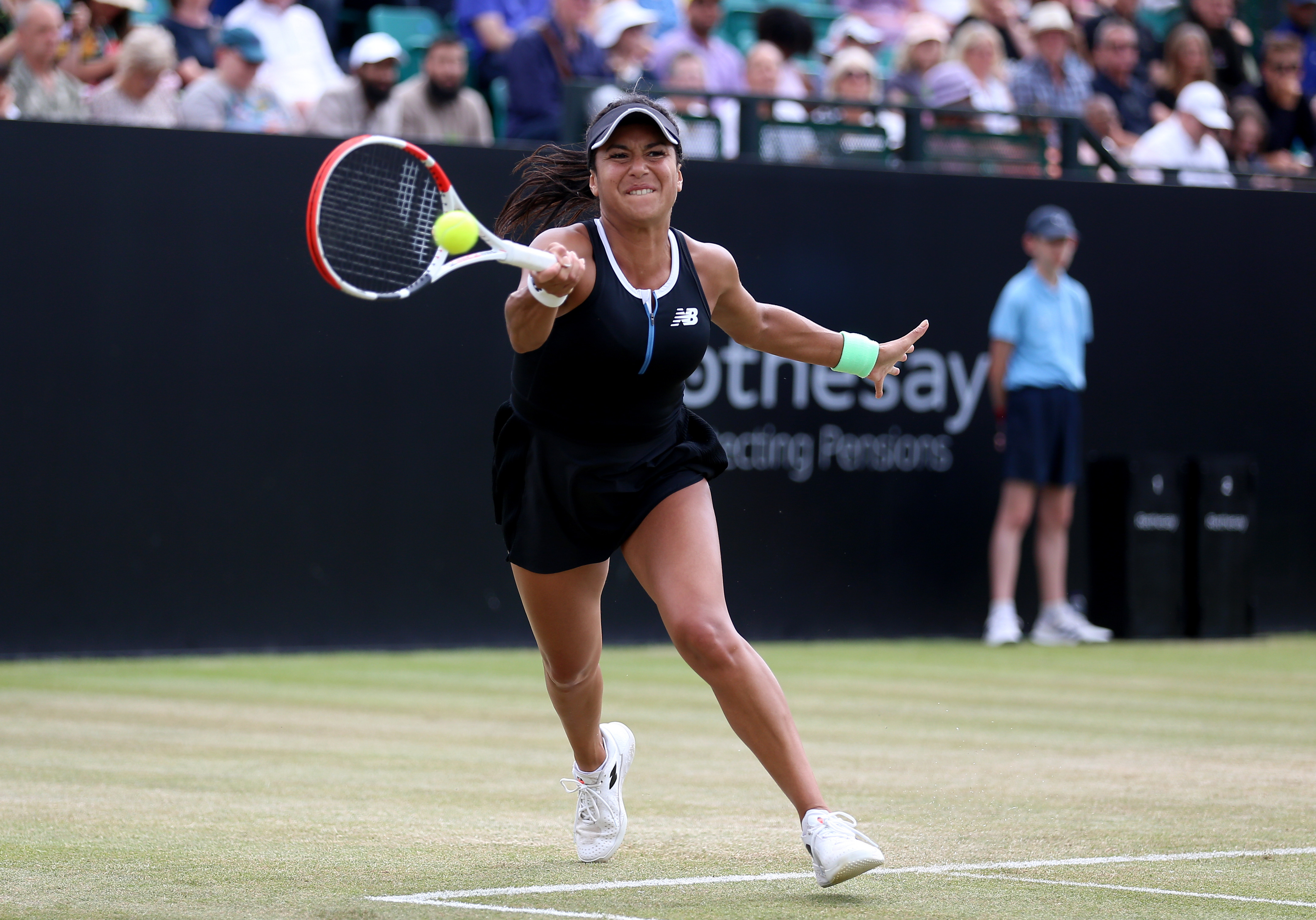 Heather Watson stretches for a forehand