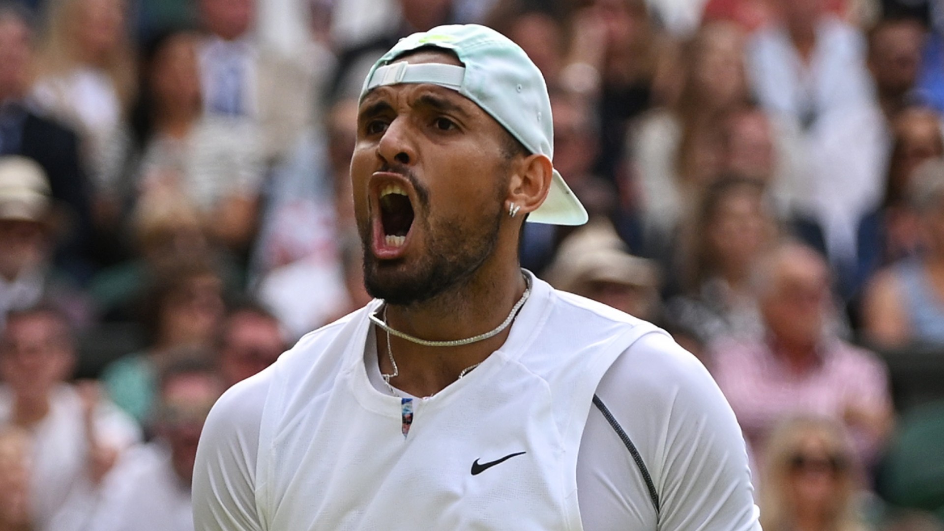Nick Kyrgios celebrates his round of 16 win at Wimbledon