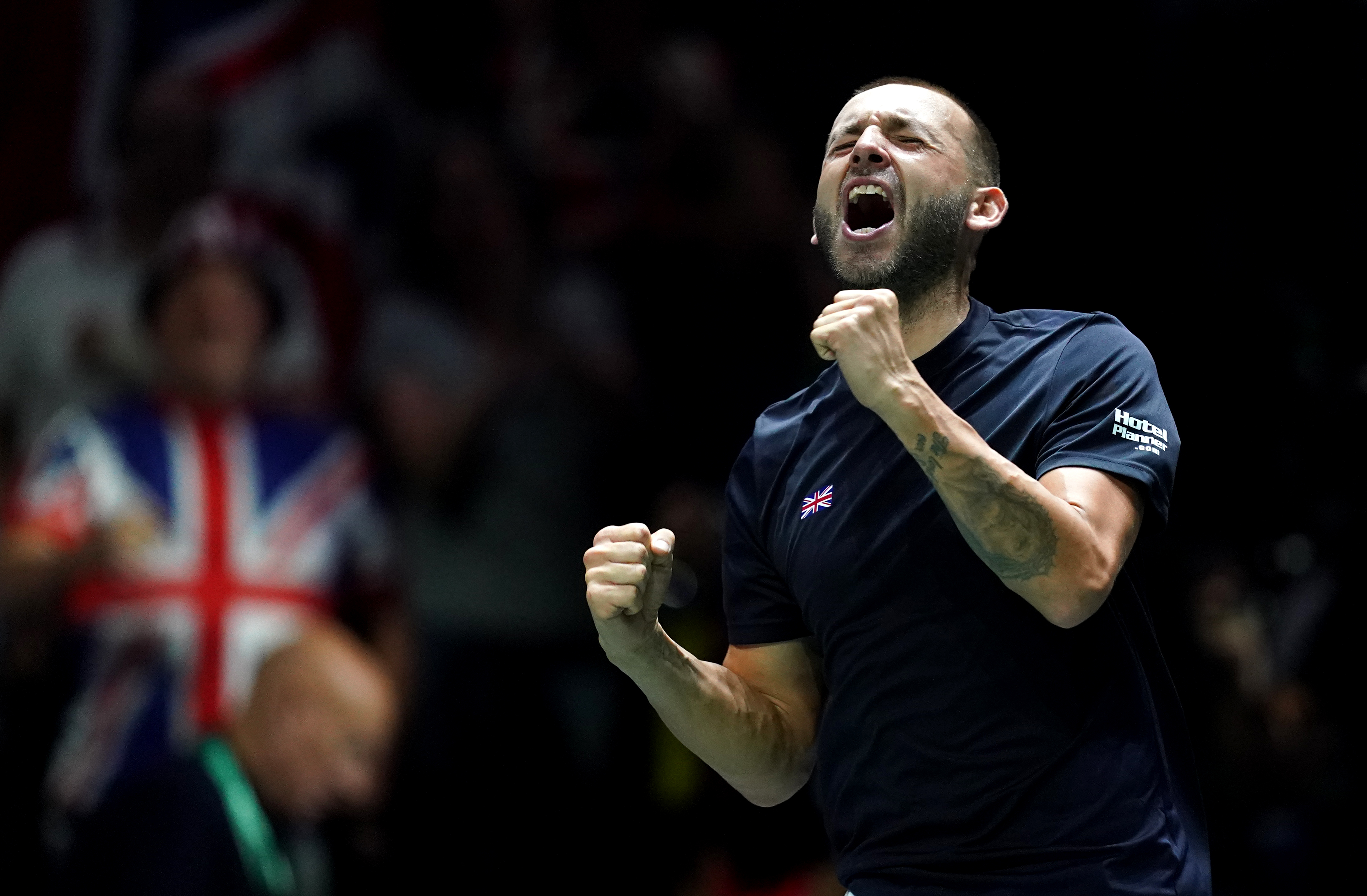 Dan Evans celebrates victory over Arthur Fils