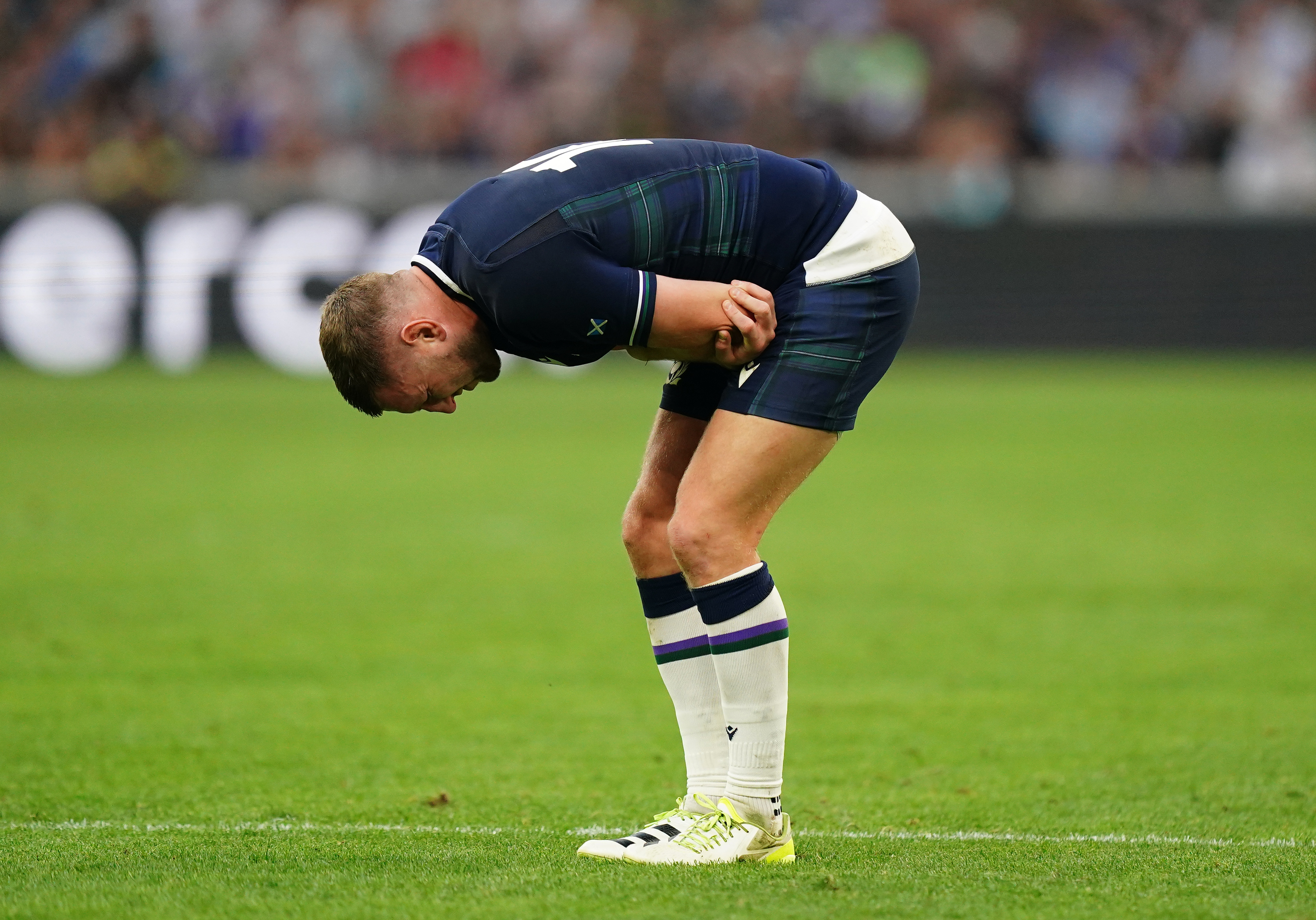 Finn Russell appeared to pick up a rib injury but played the full match