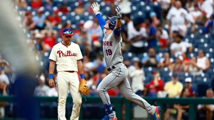 Mark Canha celebrates his second home run of the game against the Philadelphia Phillies