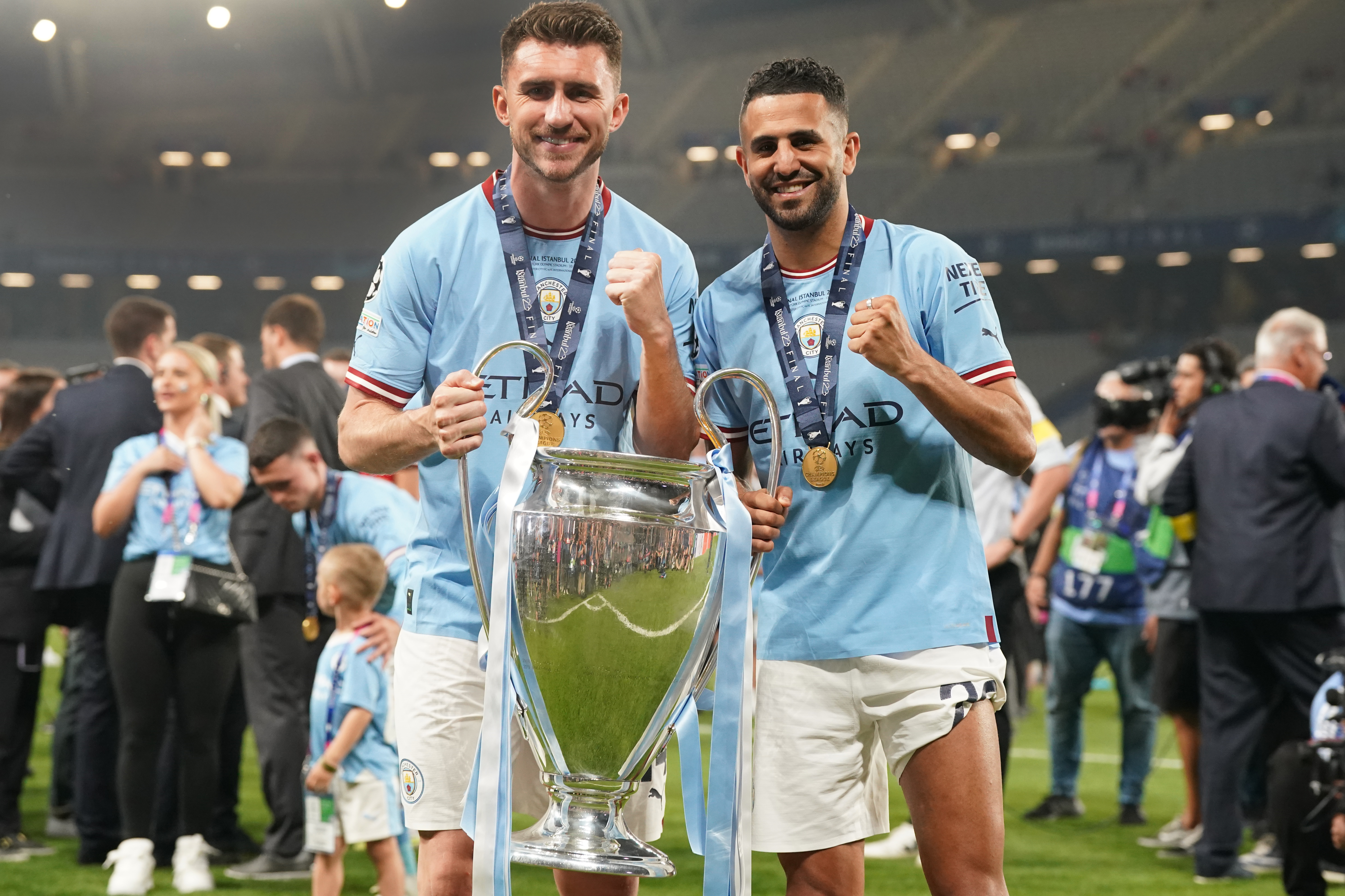 Aymeric Laporte and Riyad Mahrez celebrate winning the Champions League