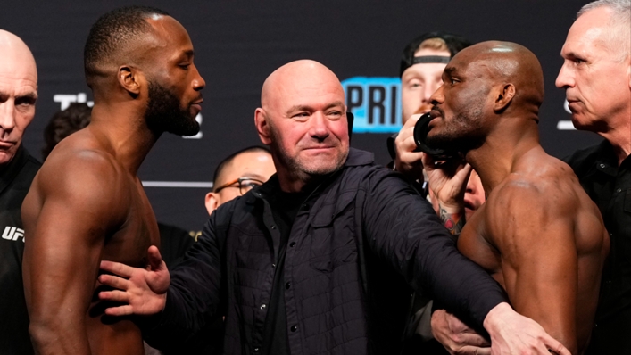 Leon Edwards (left) and Kamaru Usman being separated by Dana White at the ceremonial weigh-ins