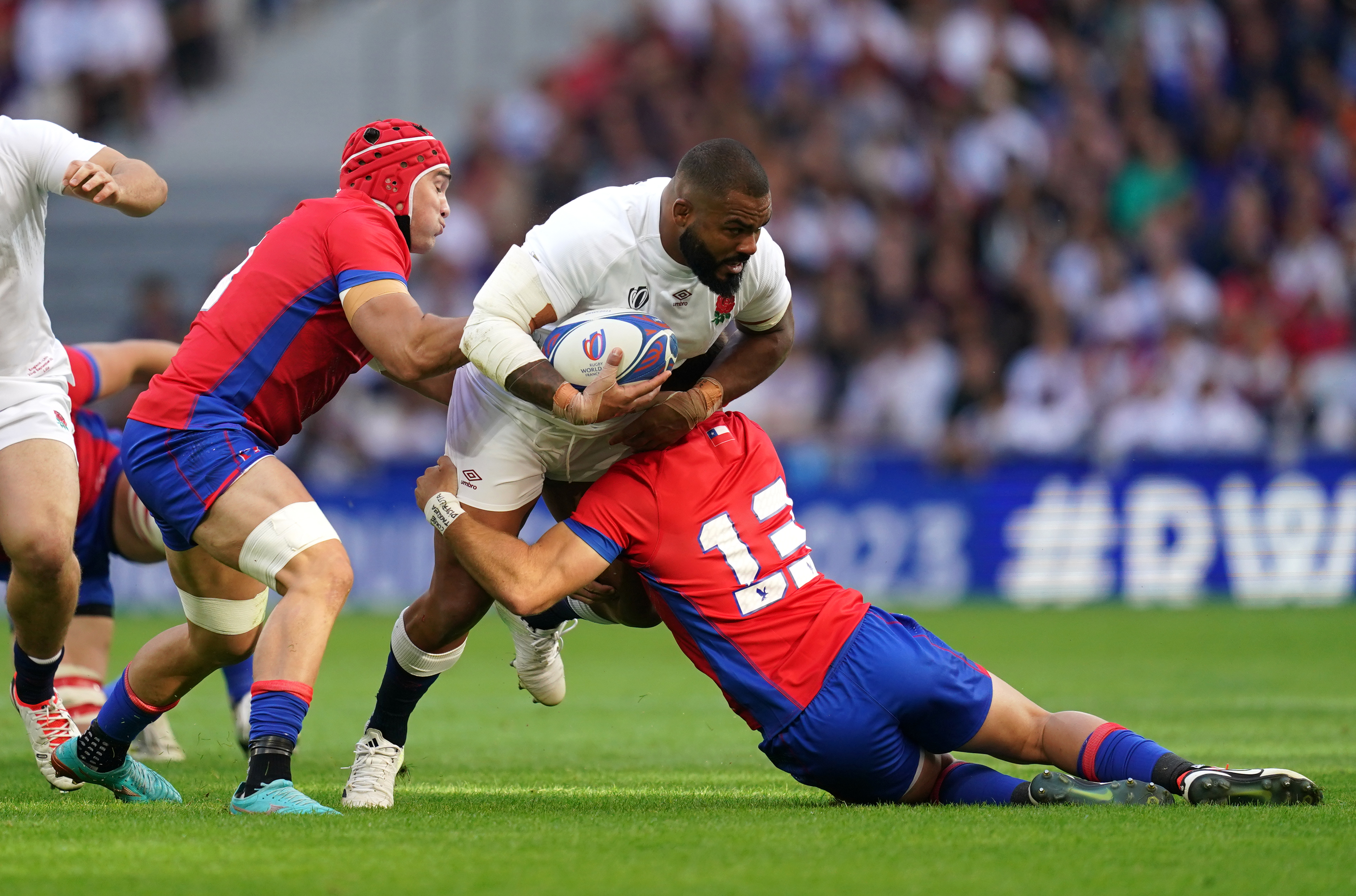 England’s Kyle Sinckler is tackled by Chile’s Domingo Saavedra