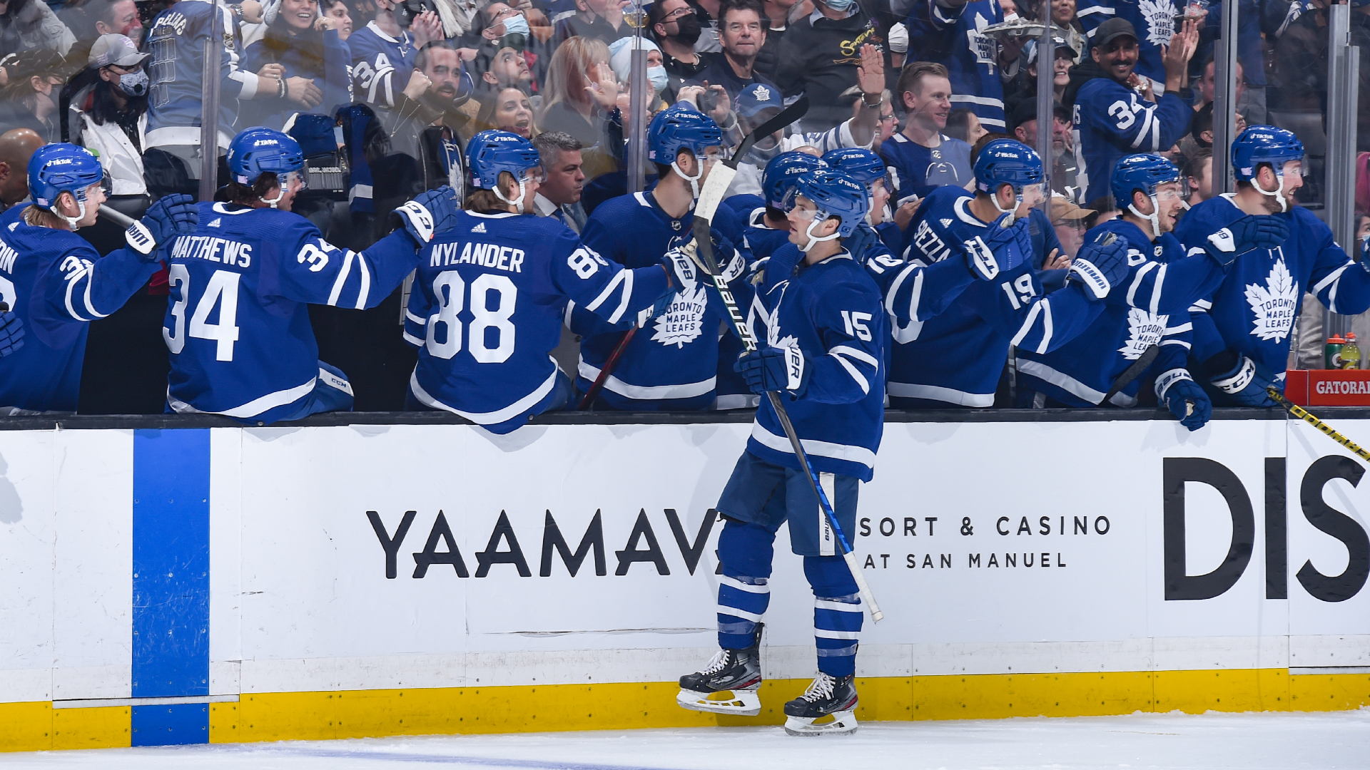 Alexander Kerfoot celebrates scoring against the Kings