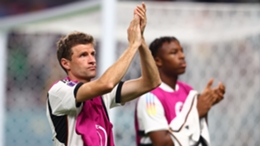 Thomas Muller applauds Germany's supporters after Wednesday's defeat to Japan