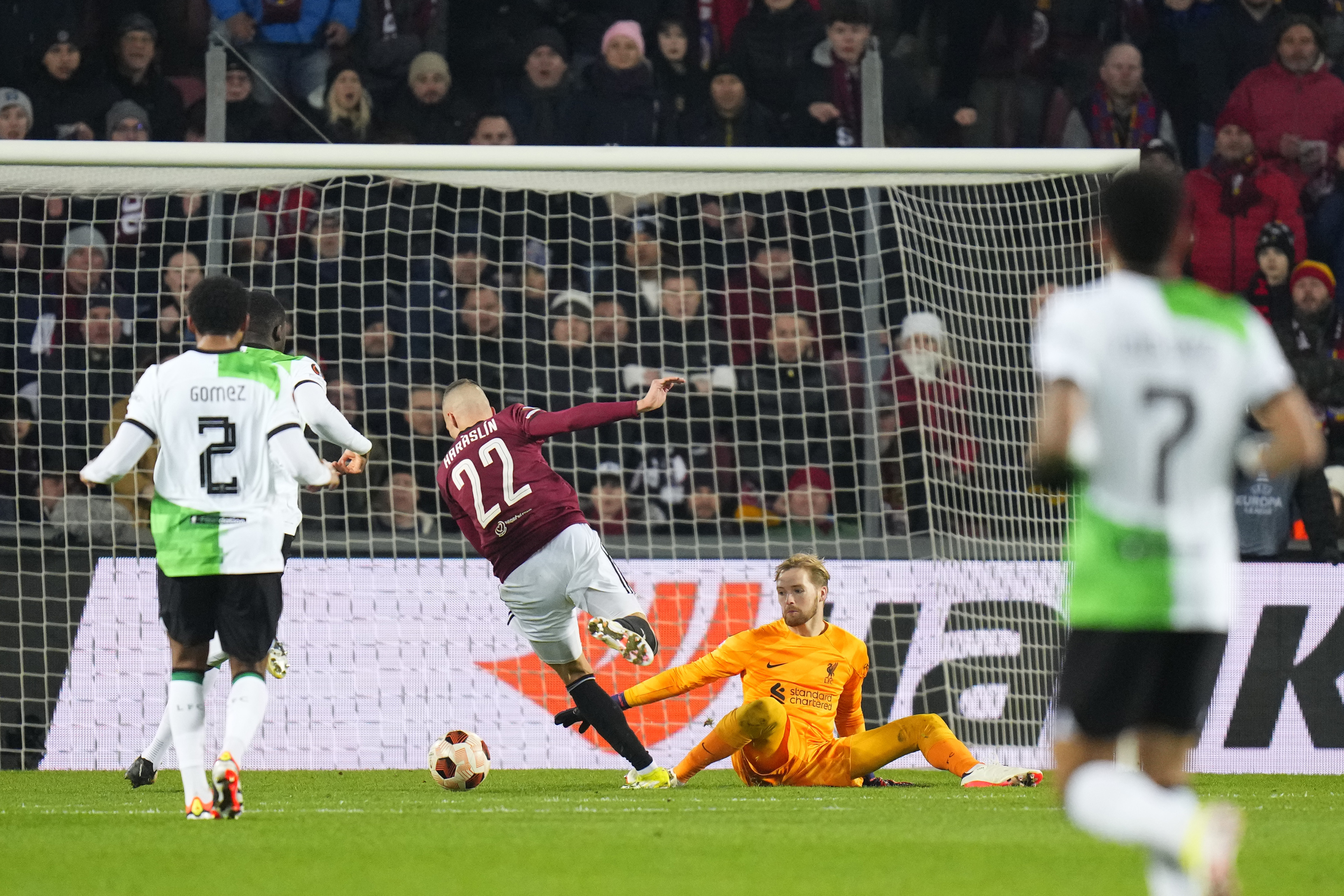 Sparta Prague’s Lukas Haraslin, centre, fails to score after getting past Liverpool’s goalkeeper Caoimhin Kelleher as he is tackled by Ibrahima Konate