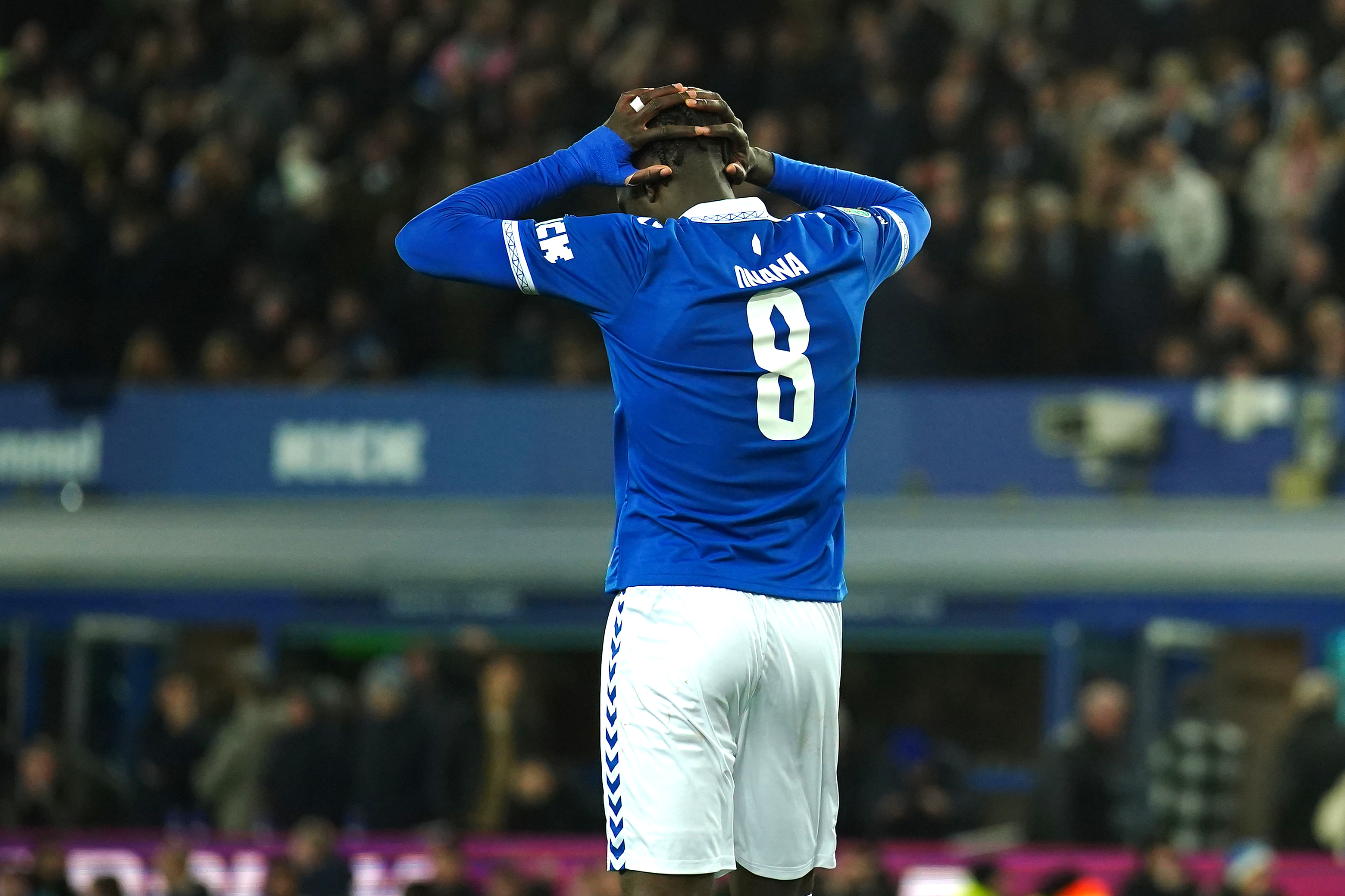 Amadou Onana reacts after his shoot-out miss