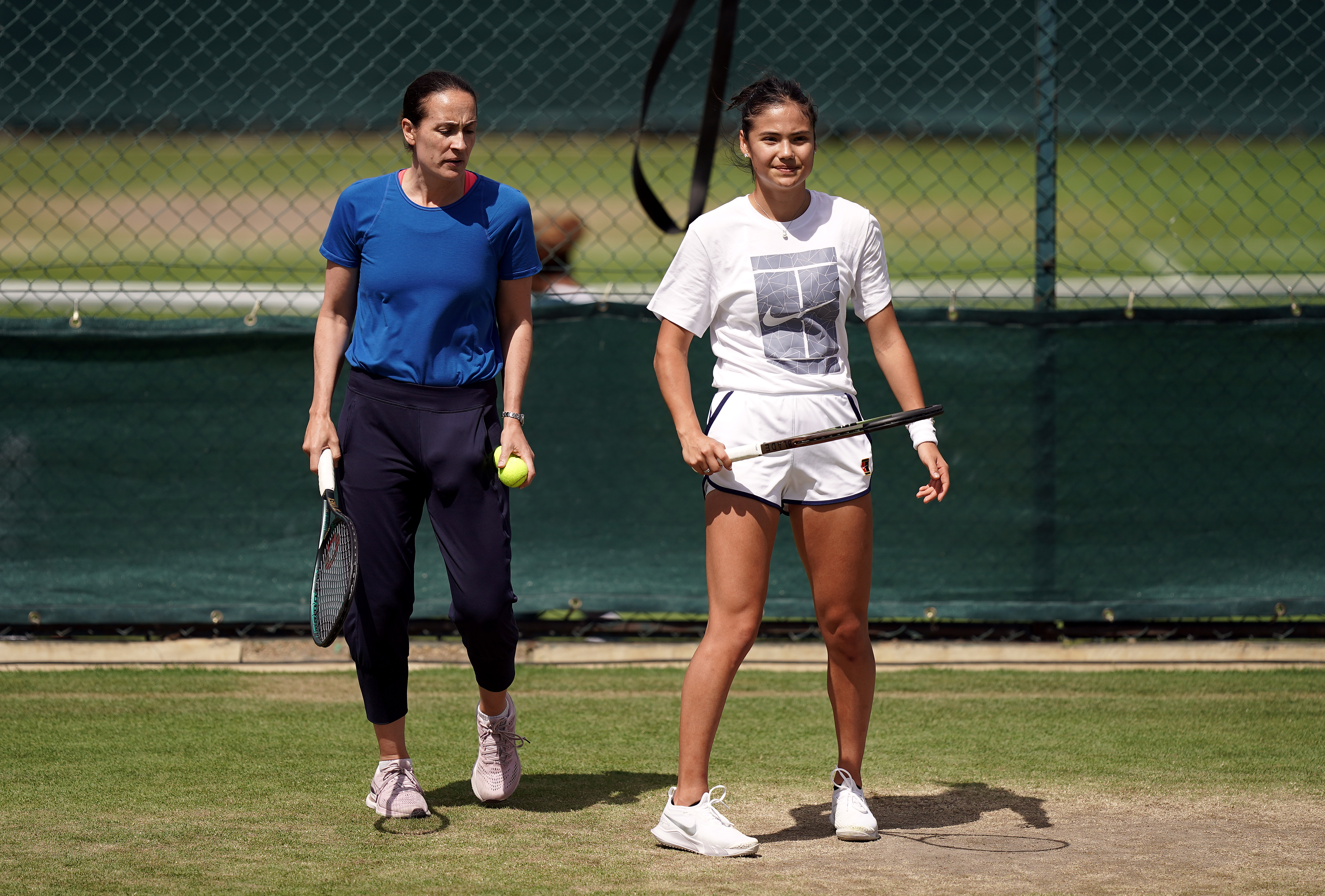 Jane O'Donoghue, left, and Emma Raducanu at Wimbledon in 2022