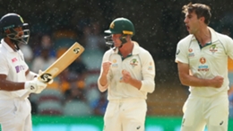 Australia captain Pat Cummins (right) celebrates dismissing Cheteshwar Pujara