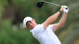Rory McIlroy plays a tee shot during his opening round in Dubai