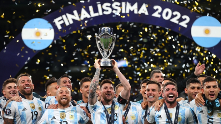 Lionel Messi holds aloft the trophy after Argentina's Finalissima win