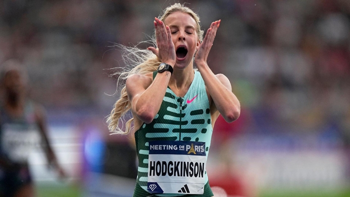 Keely Hodgkinson reacts as she crosses the finish line to win the 800 metres in a new British record (Michel Euler/AP)