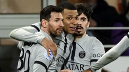 Lionel Messi and Kylian Mbappe celebrate PSG's late winner