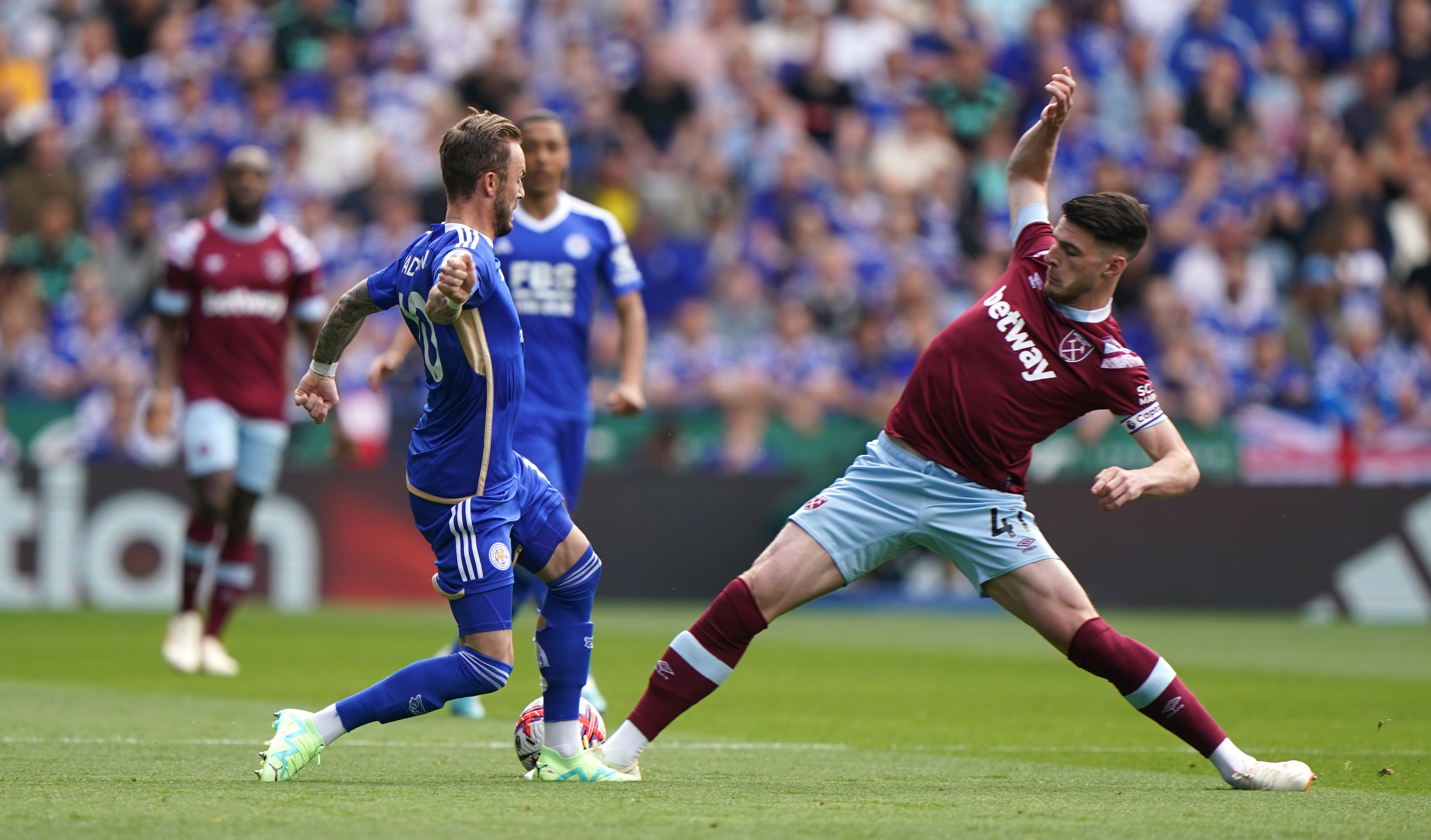 Declan Rice, right, tackles Leicester's James Maddison
