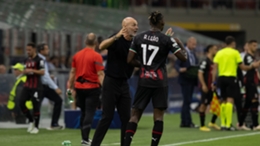 Milan head coach Stefano Pioli gives instruction to Rafael Leao during the Champions League win against Dinamo Zagreb