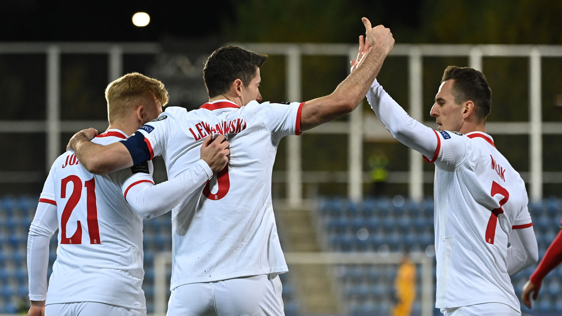 Robert Lewandowski (c) celebrates with his Poland team-mates