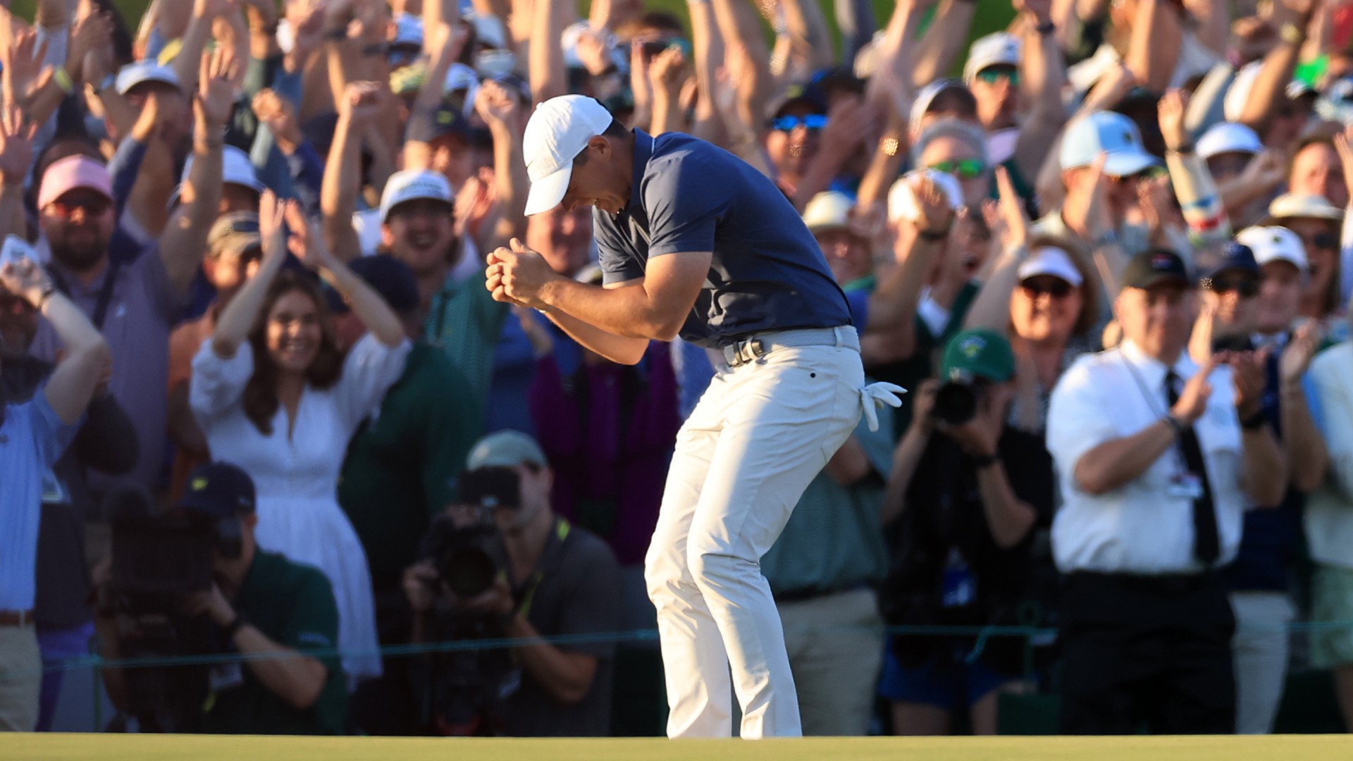 The Masters: McIlroy holds his nerve to edge out Rose in Augusta thriller