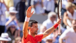 Novak Djokovic celebrates after winning at the French Open on Friday