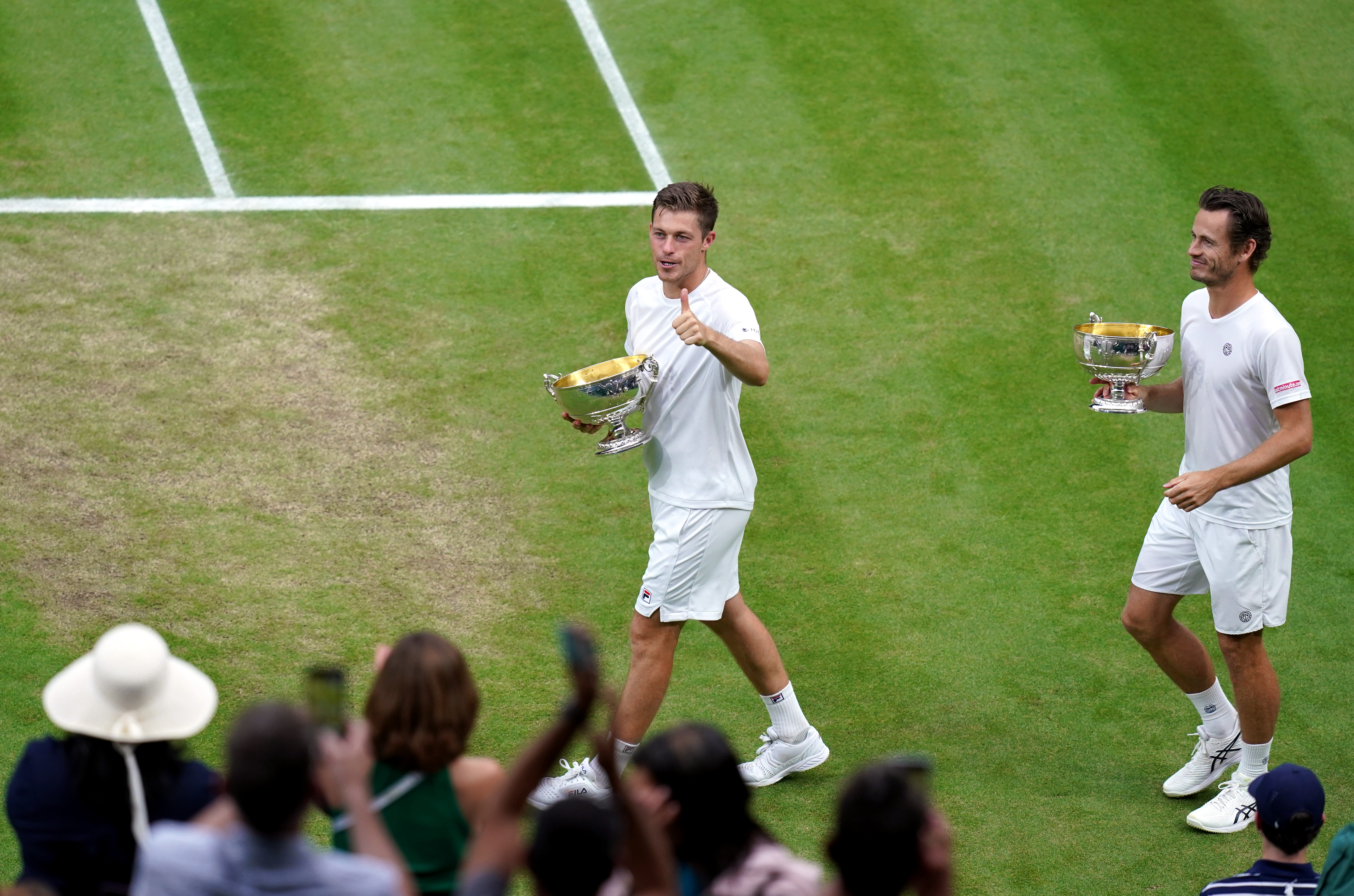 Neal Skupski (left) and Wesley Koolhof celebrate victory