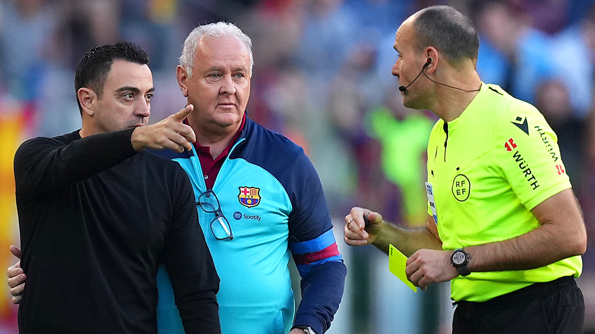 Xavi was booked by Antonio Mateu Lahoz