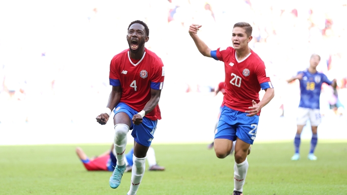 Keysher Fuller (L) celebrates his goal for Costa Rica against Japan at the 2022 World Cup