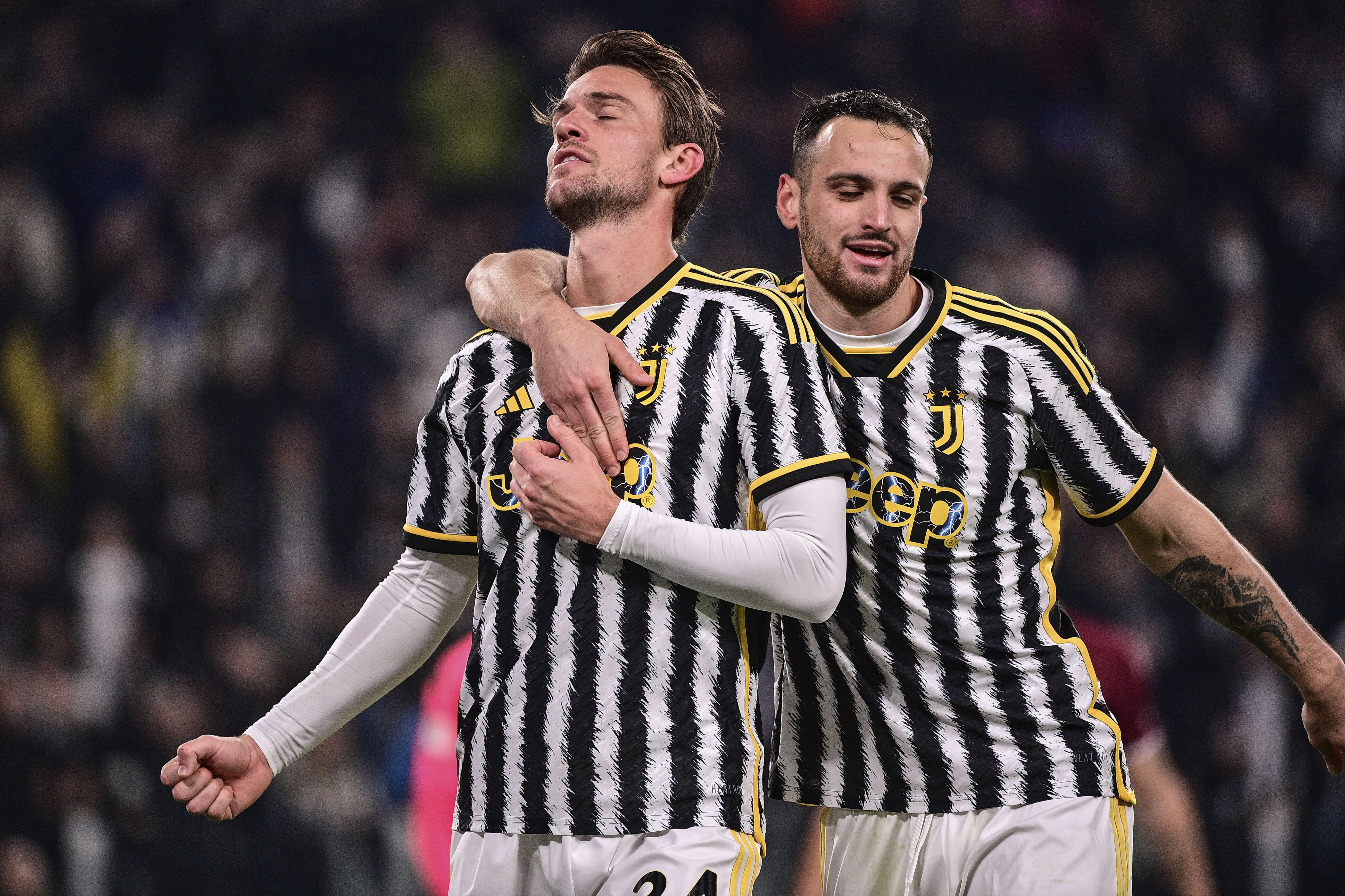 Daniele Rugani, left, celebrates with teammate Federico Gatti after scoring Juve's third