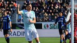 Edin Dzeko celebrates one of two goals on Sunday