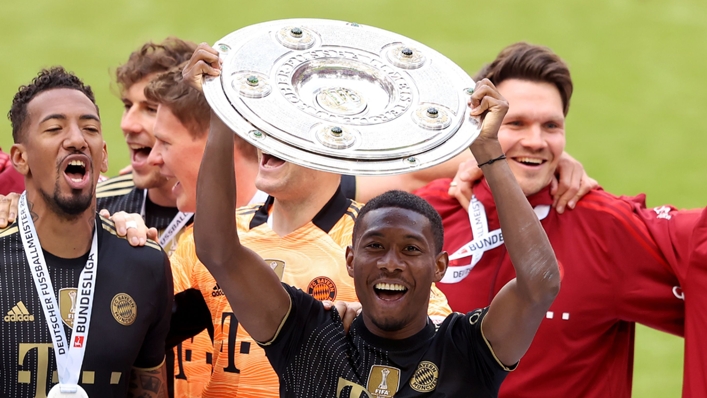 David Alaba lifts the Bundesliga trophy for one last time