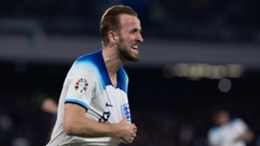 Harry Kane celebrates after scoring his record-breaking goal in Naples