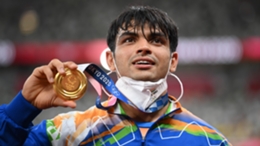 Neeraj Chopra celebrates his famous gold medal