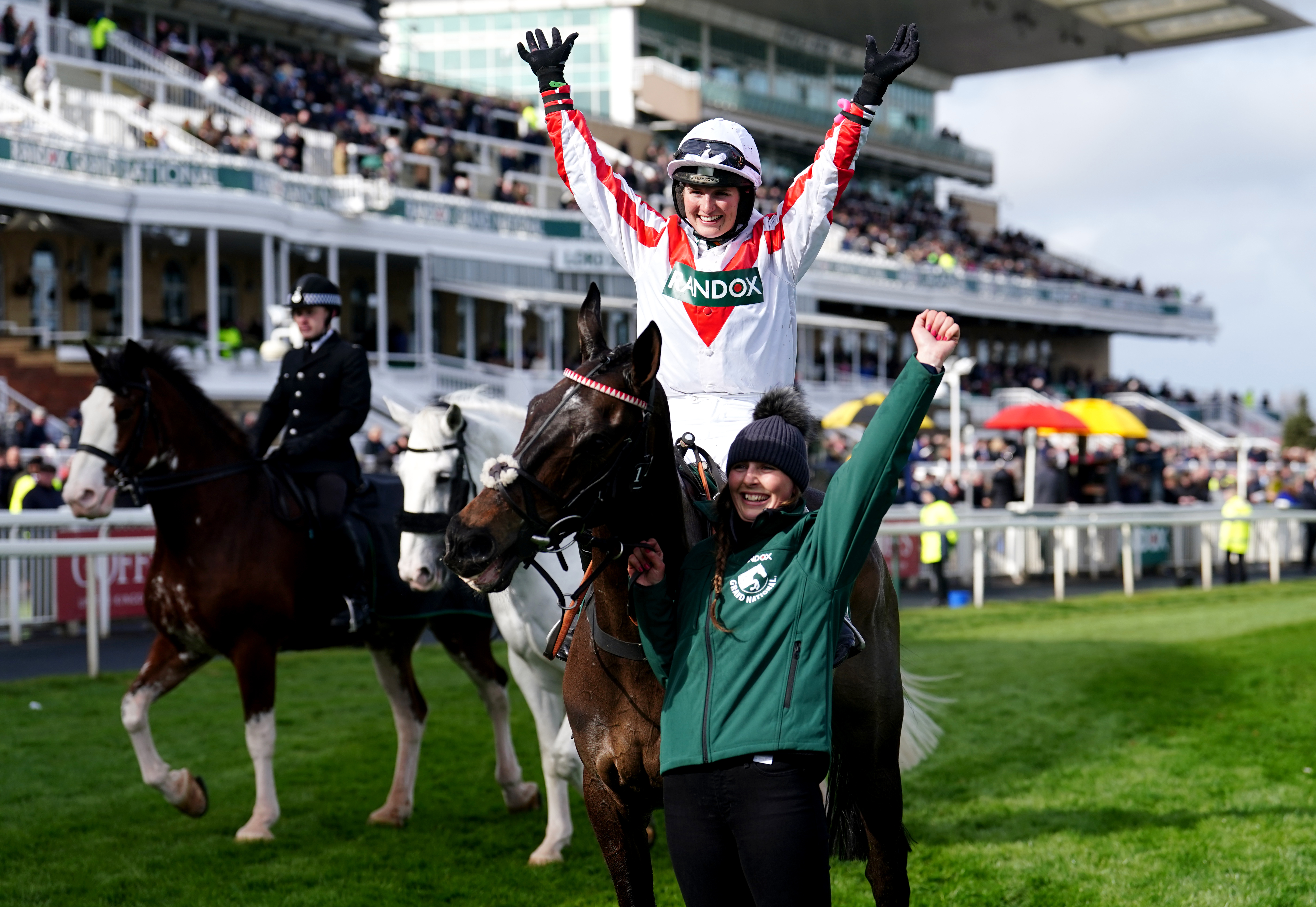Gina Andrews celebrates on Latenightpass after winning the Randox Foxhunters’ Open Hunters’ Chase in 2022