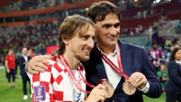Captain Luka Modric and coach Zlatko Dalic celebrate Croatia's World Cup bronze medal