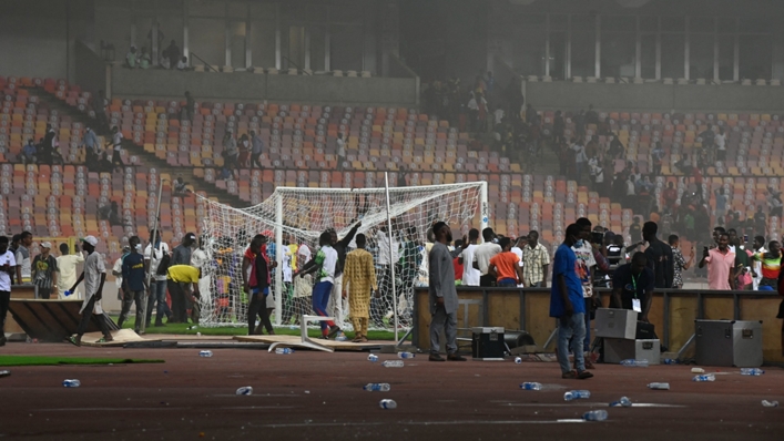 Nigeria fans stormed the pitch after their side's aggregate defeat to Ghana