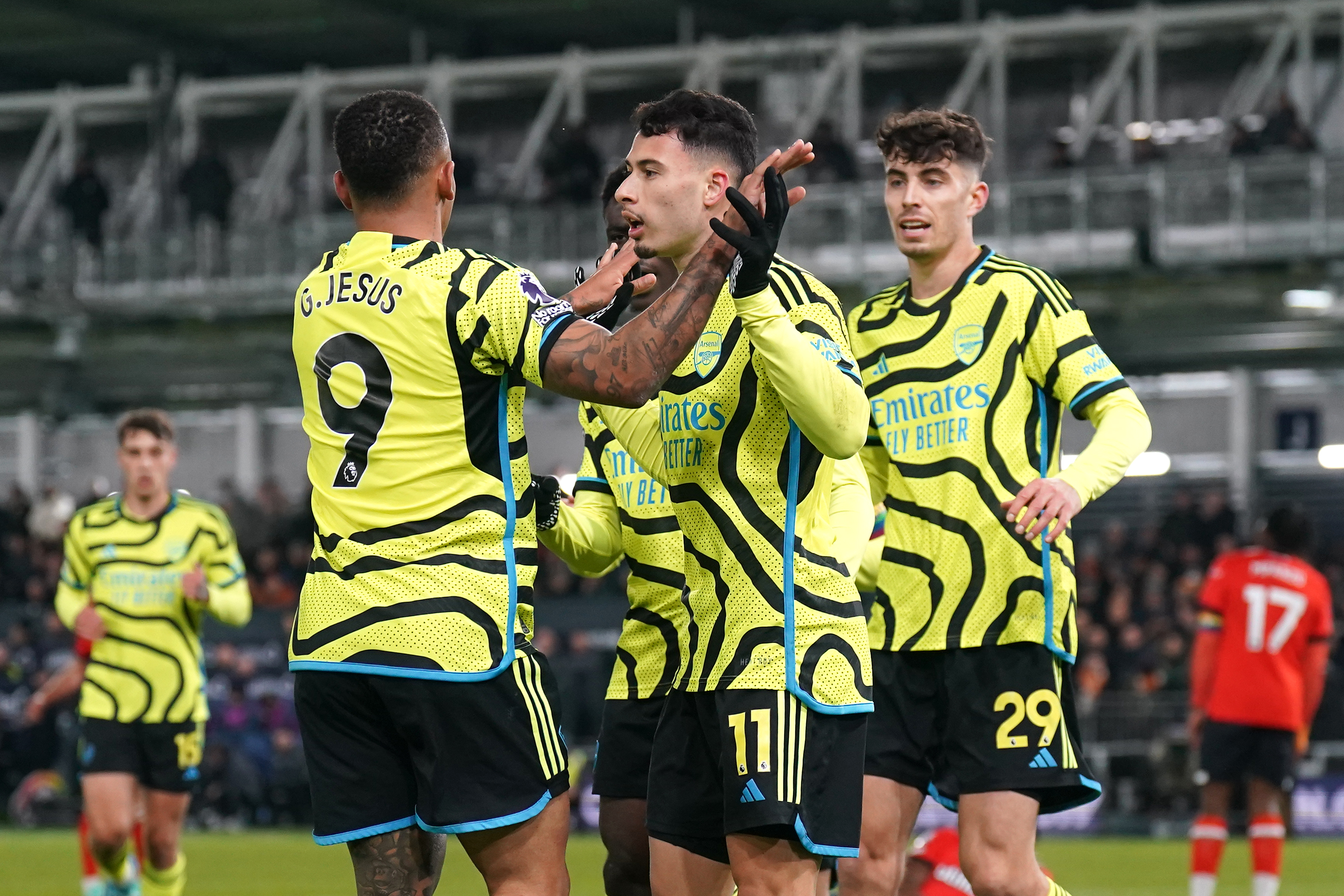 Gabriel Martinelli, centre, celebrates scoring Arsenal’s first goal