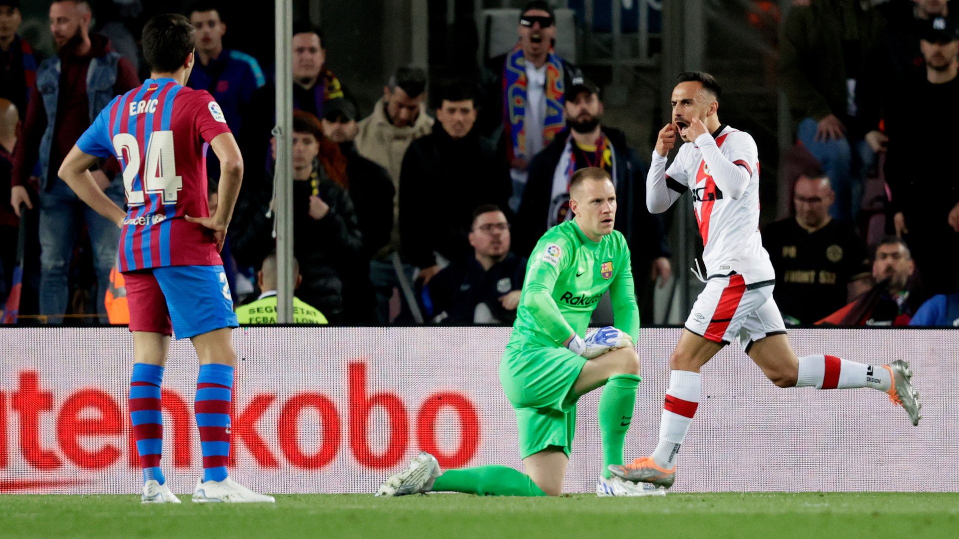 Alvaro Garcia, in white, celebrates his goal