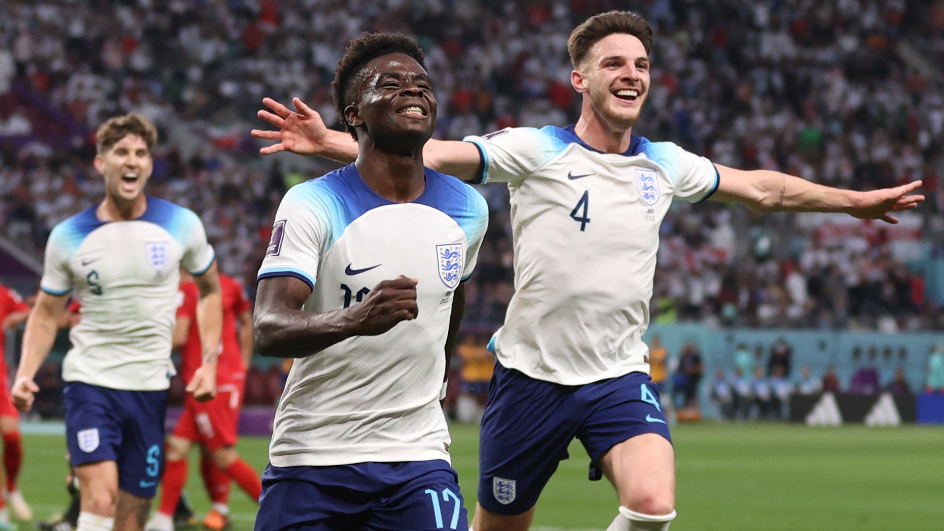 Bukayo Saka celebrates after scoring England's second goal against Iran