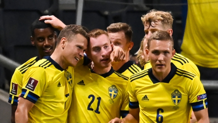 Sweden celebrate Viktor Claesson's second-half goal against Spain.