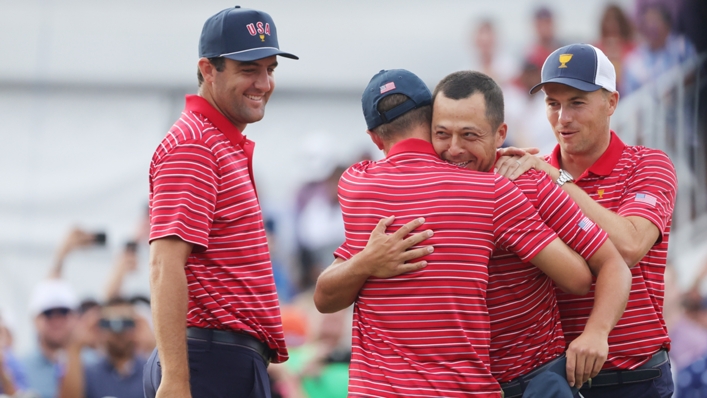 Scottie Scheffler, Justin Thomas and Jordan Spieth congratulate Xander Schauffele after his victory secured The Presidents Cup for the United States