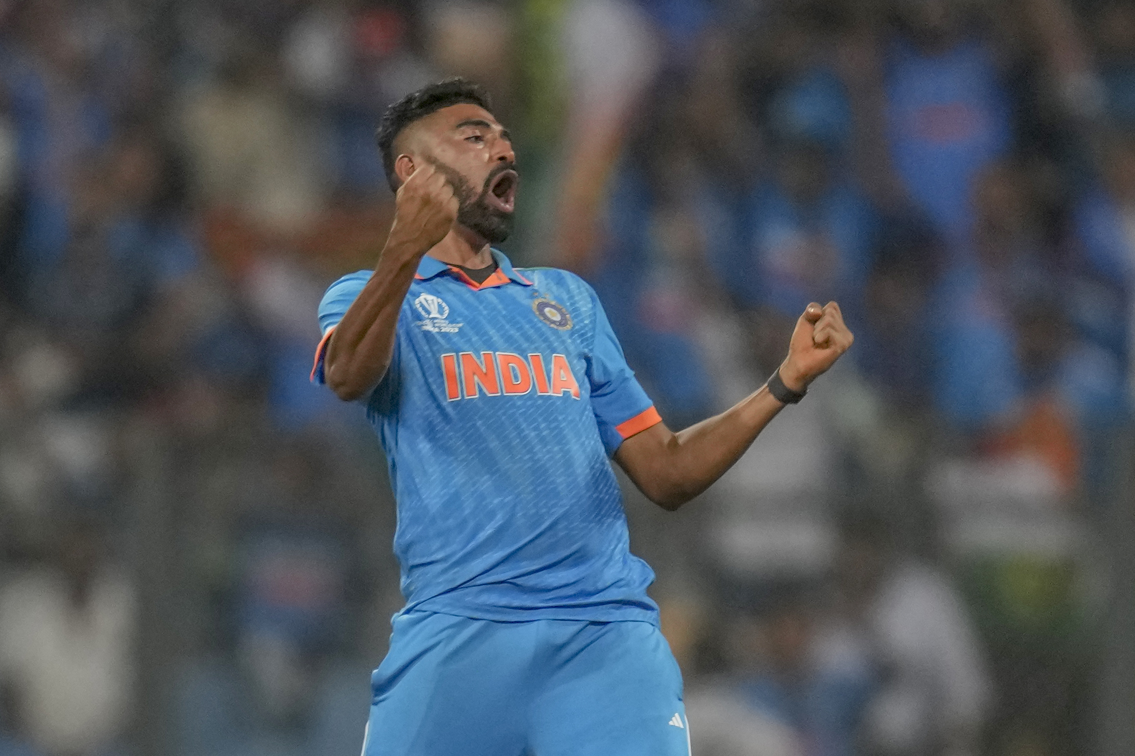 Mohammed Siraj celebrates the dismissal of Sri Lanka’s Dimuth Karunaratne