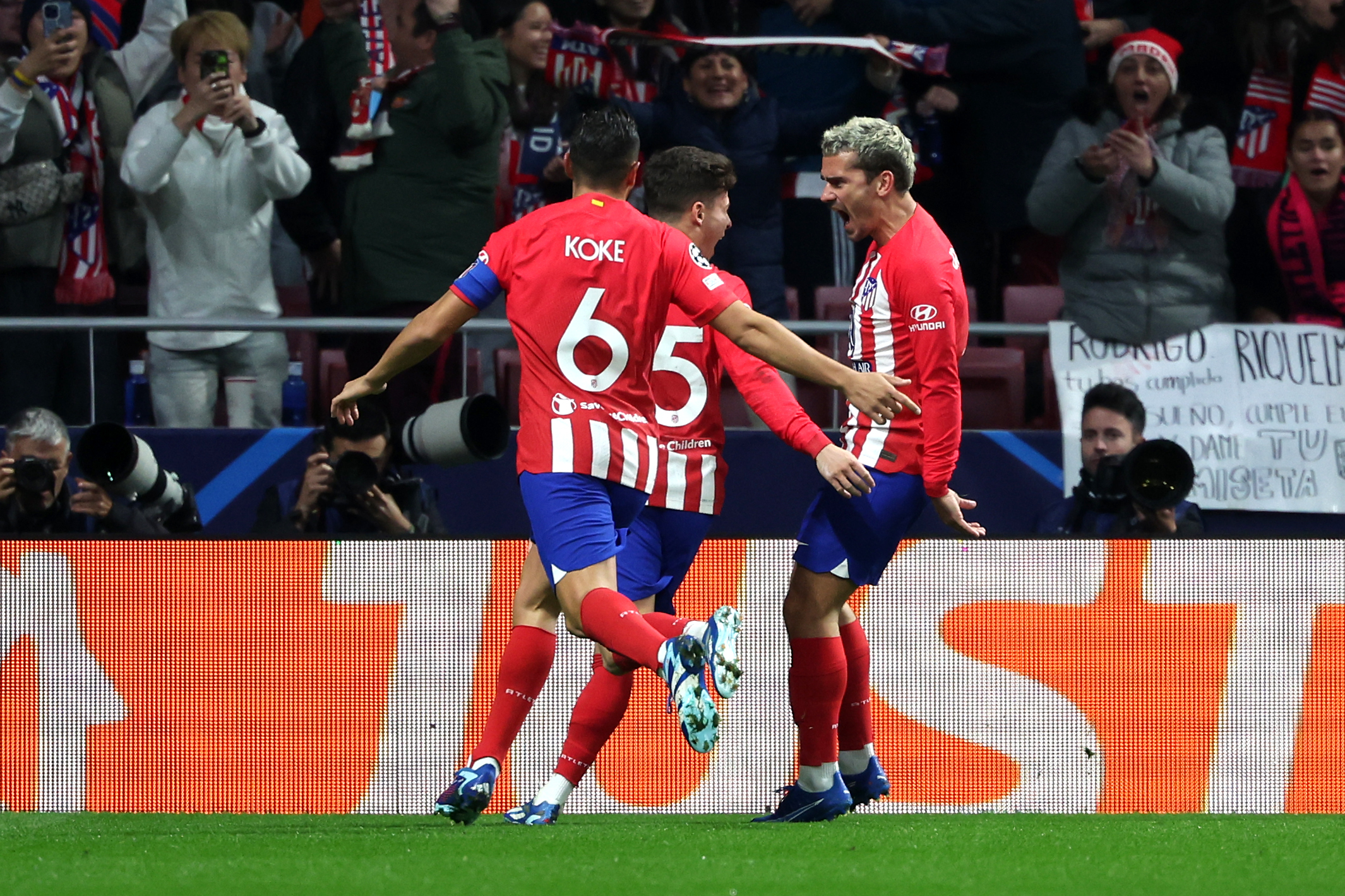 Antoine Griezmann (right) celebrates the opening goal