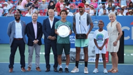 Nick Kyrgios and Yoshihito Nishioka being presented with their trophies after the Washington Open final