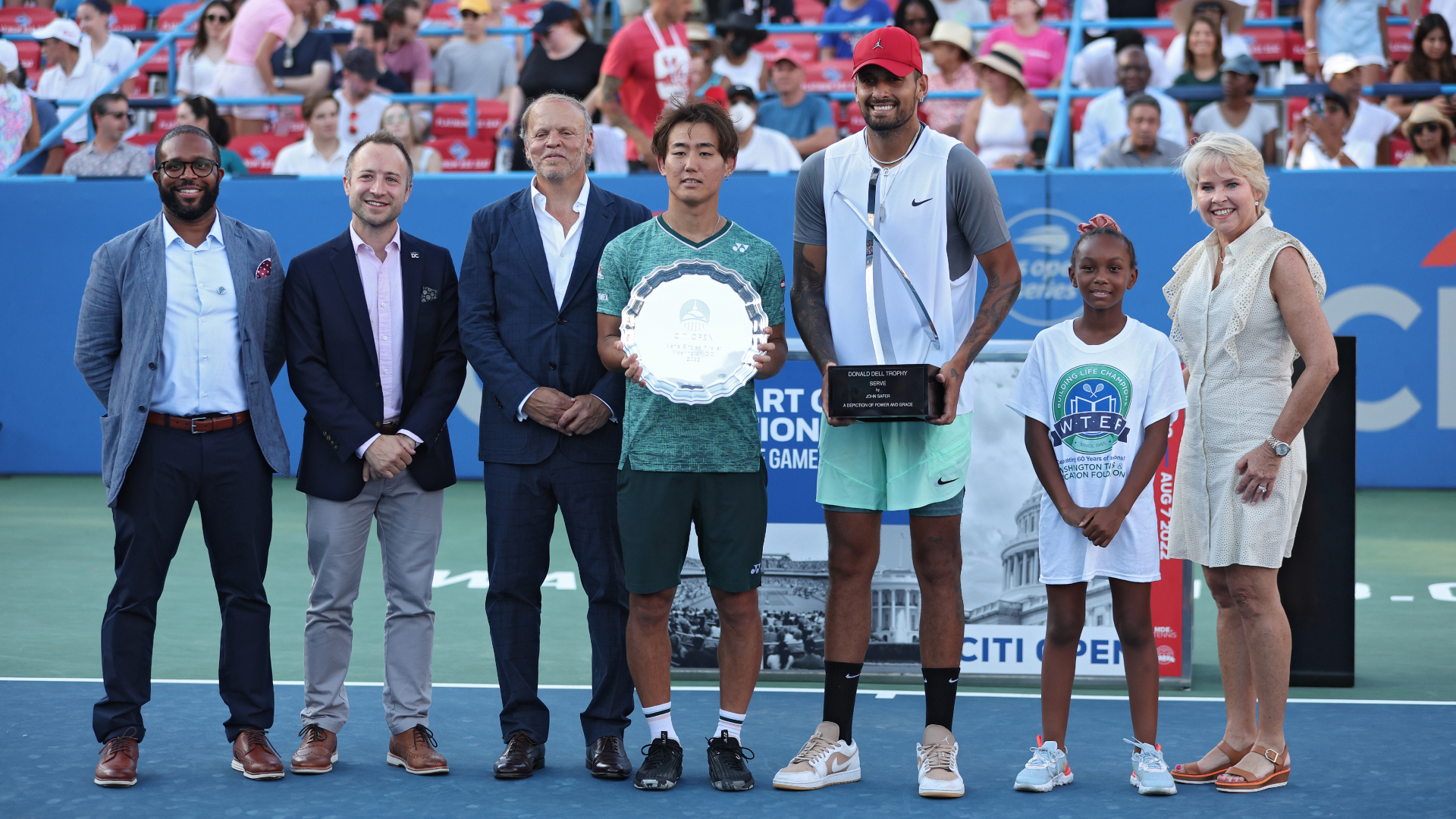 Nick Kyrgios and Yoshihito Nishioka being presented with their trophies after the Washington Open final