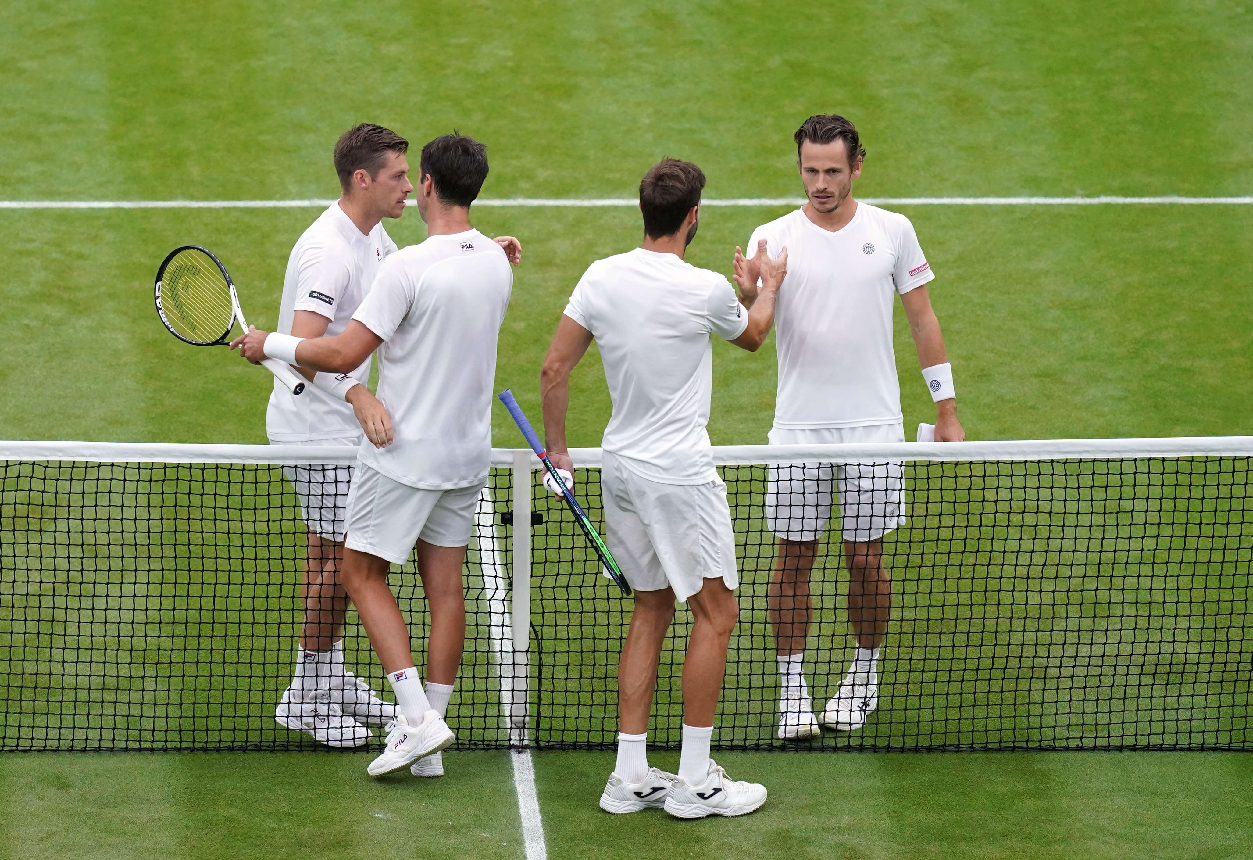 Wesley Koolhof (right) and Neal Skupski (left) celebrate their victory over Marcel Granollers and Horacio Zeballos