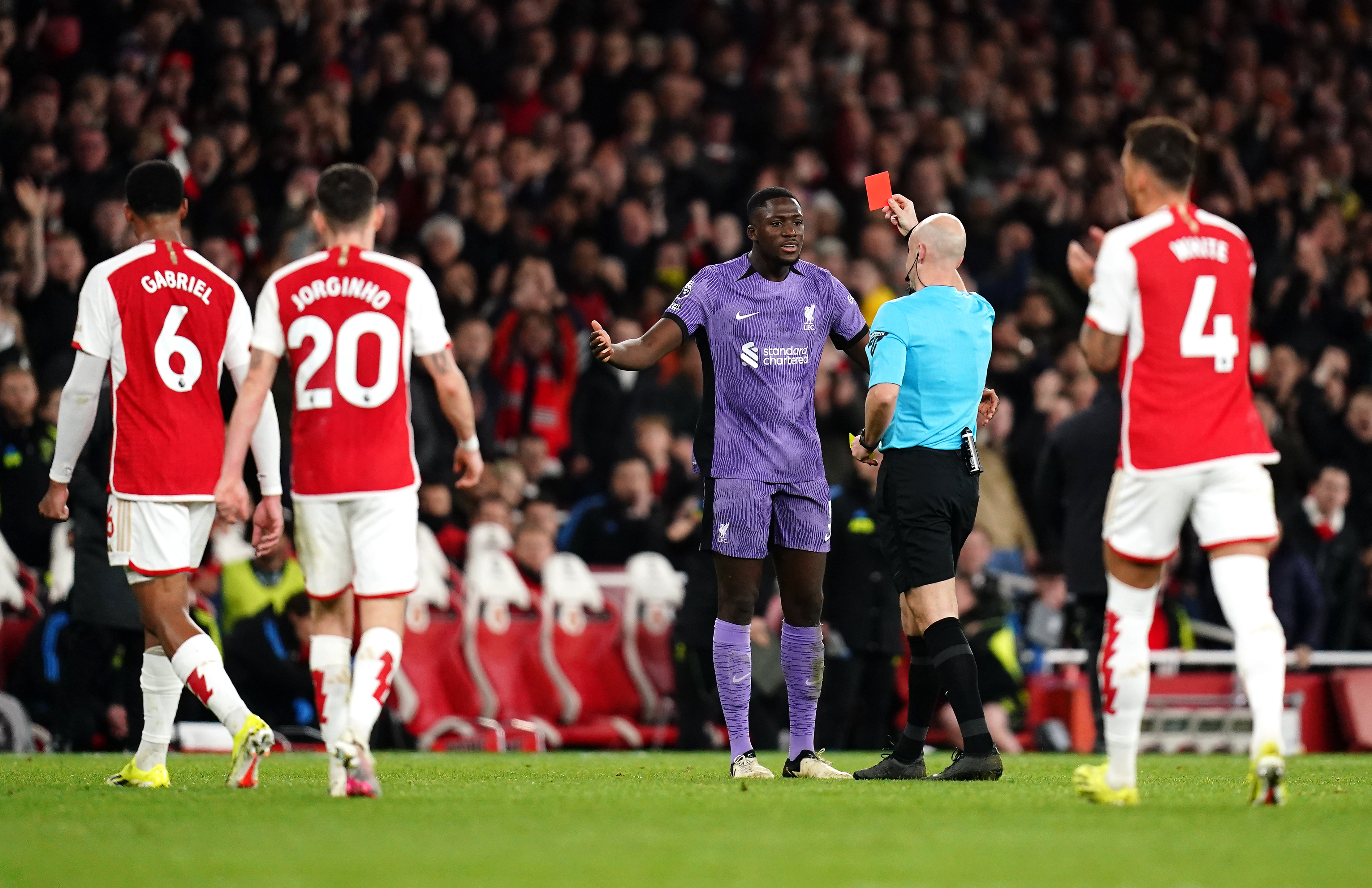 Arsenal capitalise on Alisson Becker errors to cut Liverpool lead to two points