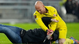 Marko Dmitrovic pins his attacker during PSV's win over Sevilla