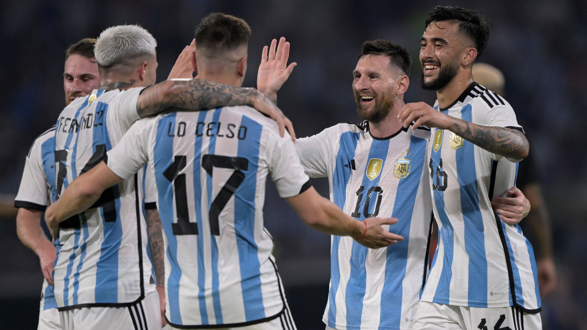 Argentina's Lionel Messi celebrates with Enzo Fernandez, Giovani Lo Celso and Nicolas Gonzalez after scoring against Curacao.
