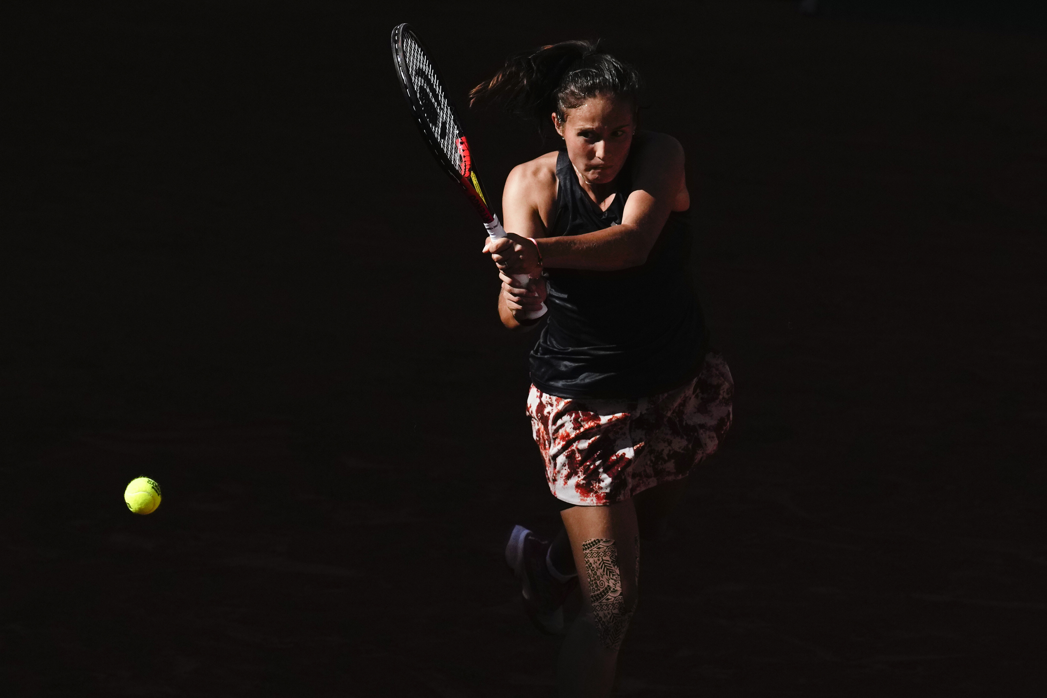 Daria Kasatkina steps into the light to play a backhand
