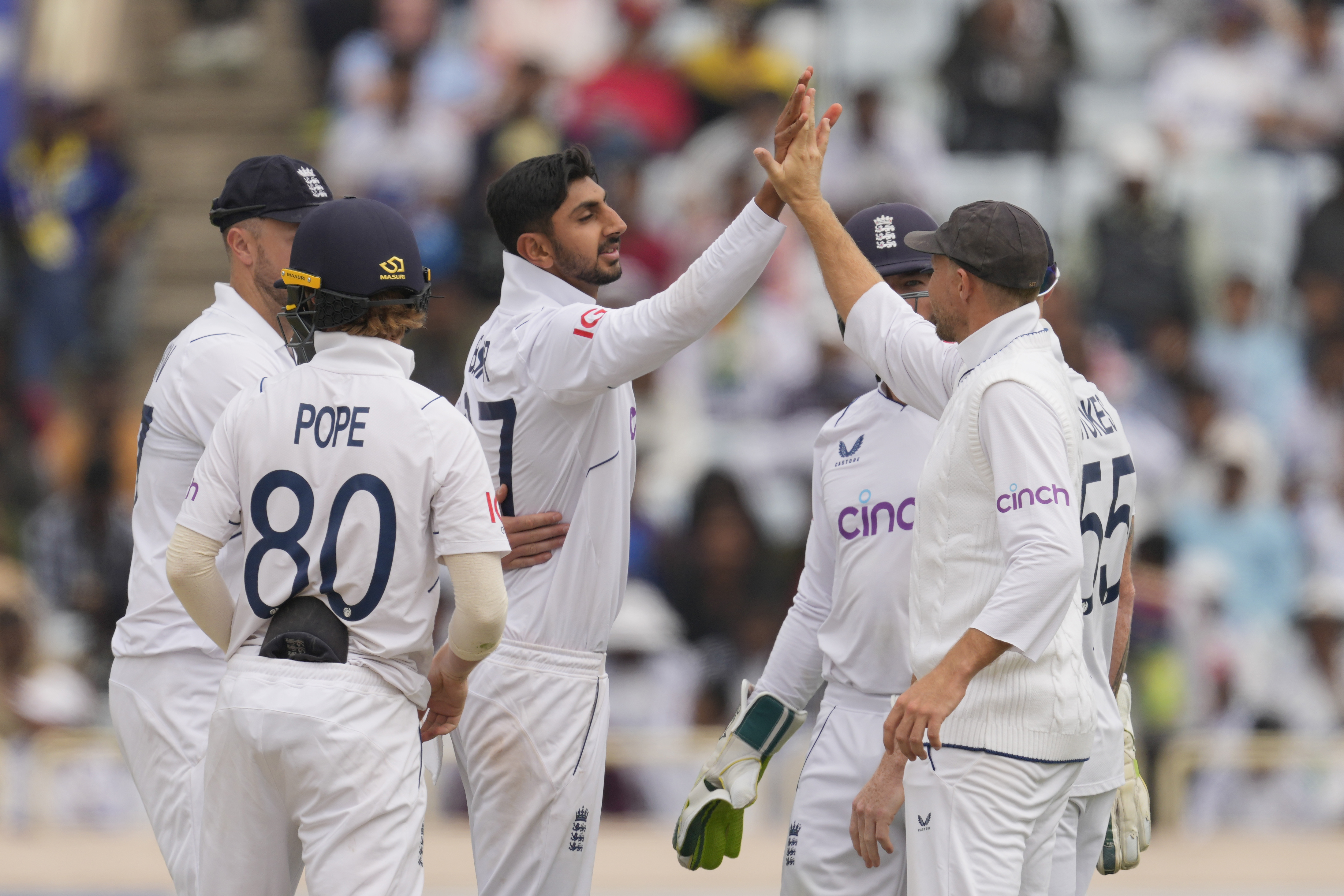 England’s Shoaib Bashir, (centre) took five wickets in India's first innings in the fourth Test