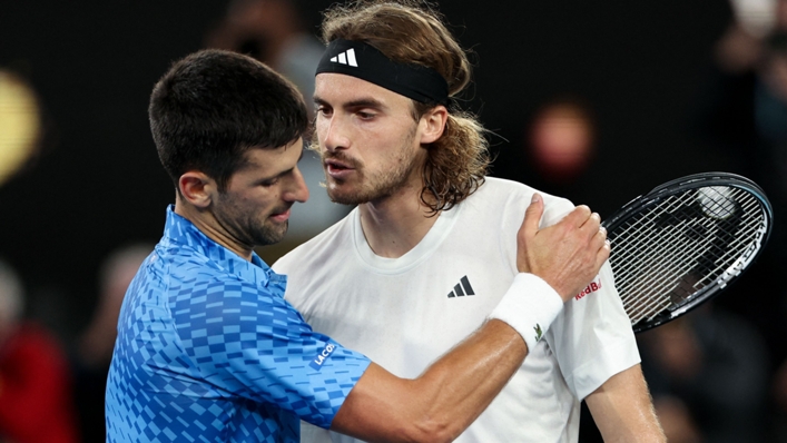 Novak Djokovic and Stefanos Tsitsipas embrace after their duel